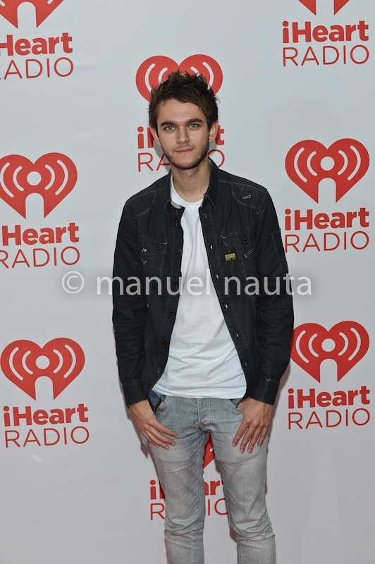 Zedd poses backstage during the 2013 iHeartRadio Music Festival 