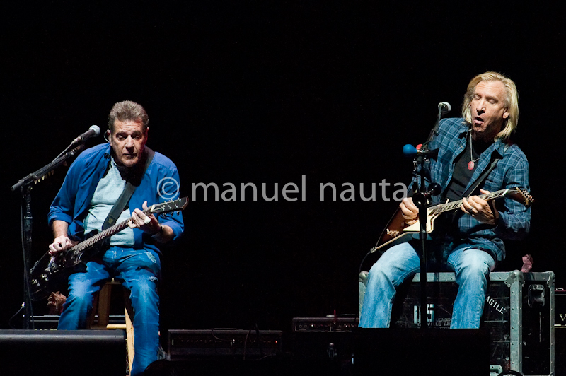 Glenn Frey (L) and Joe Walsh with the Eagles perform in concert on the "History Of The Eagles" tour at the Toyota Center on February 21, 2014 in Houston, Texas - USA