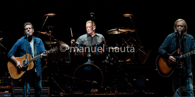 (L-R) Glen Frey, Don Henley and Joe Walsh with the Eagles perform in concert on the "History Of The Eagles" tour at the Toyota Center on February 21, 2014 in Houston, Texas - USA