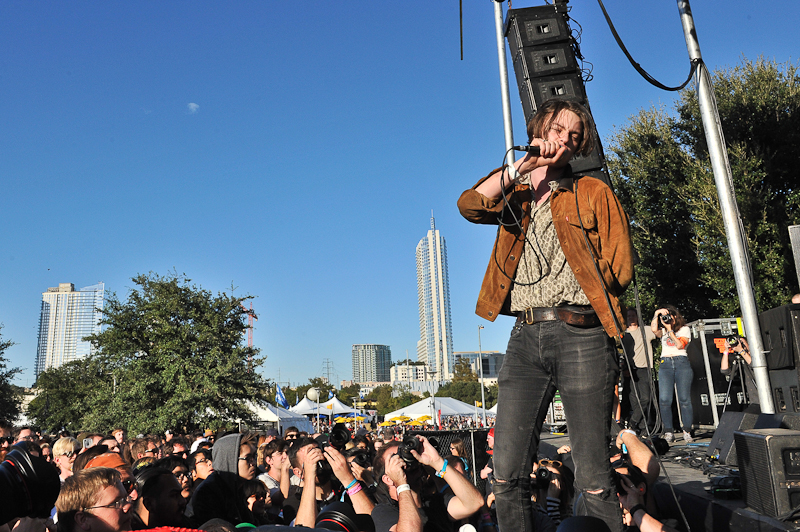 Elias Ronnenfelt of the band Iceage performs in concert during Day 2 of FunFunFun Fest at Auditorium Shores on November 8, 2014 in Austin, Texas. Photo © Manuel Nauta