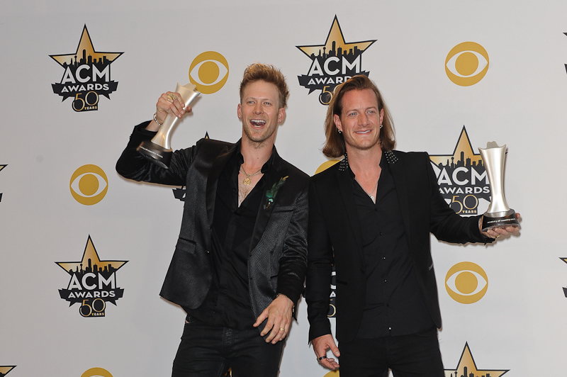 Musicians Brian Kelley (L) and Tyler Hubbard of Florida Georgia Line, winners of Vocal Duo of the Year Award; and Vocal Event of the Year for 'This Is How We Roll', pose in the press room at the 50th Academy Of Country Music Awards at AT&T Stadium on April 19, 2015 in Arlington, Texas. Photo © Manuel Nauta