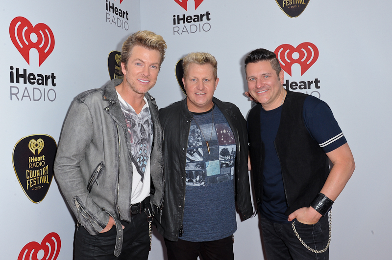 Singers J.D. Rooney, Gary LeVox and Jay DeMarcus of Rascal Flatts pose backstage at the 2015 iHeartRadio Country Festival at The Frank Erwin Center on May 2, 2015 in Austin, Texas.  Photo © Manuel Nauta
