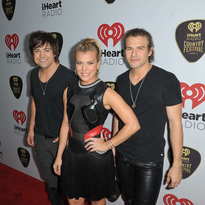 Musicians Neil Perry, Kimberly Perry and Reid Perry of The Band Perry attend the 2015 iHeartRadio Country Festival at The Frank Erwin Center on May 2, 2015 in Austin, Texas. Photo © Manuel Nauta
