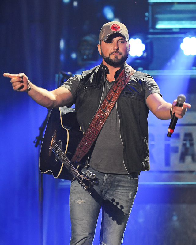 Musician Tyler Farr performs onstage during the 2015 iHeartRadio Country Festival at The Frank Erwin Center on May 2, 2015 in Austin, Texas. Photo © Manuel Nauta