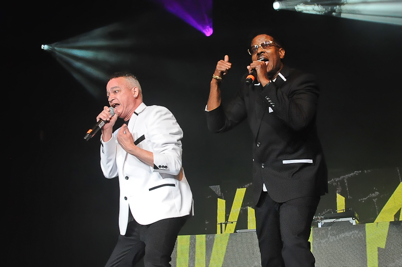 Christopher 'Kid' Reid (L) and Christopher 'Play' Martin of Kid 'n Play perform onstage as part of 'I Love the 90's' at Cedar Park Center on February 5, 2016 in Cedar Park, Texas. Photo © Manuel Nauta