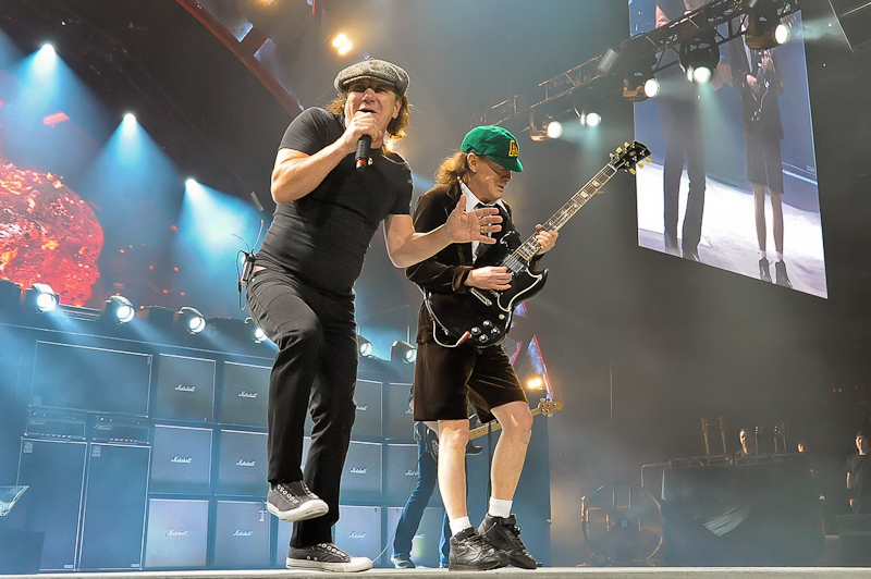 Brian Johnson (L) and Angus Young perform with AC/DC on the Rock or Bust Tour at the American Airlines Center on February 23, 2016 in Dallas, Texas. Photo © Manuel Nauta